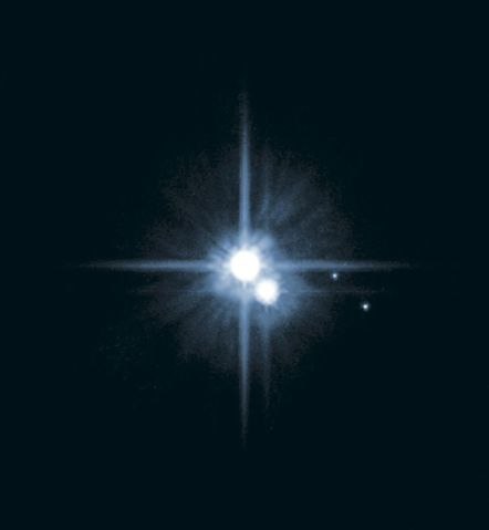Файл:Плутон и его крупнейшие спутники 27635.jpg